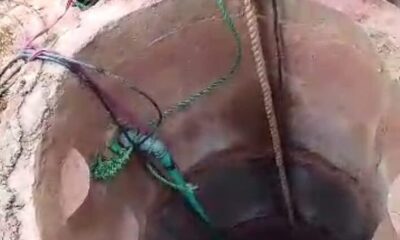 One of the officials of the state Fire Service trying to recover the corpse from the well in Saki 708x430 (1)